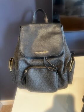 Michael Kors Black Monogram Backpack with Gold Hardware